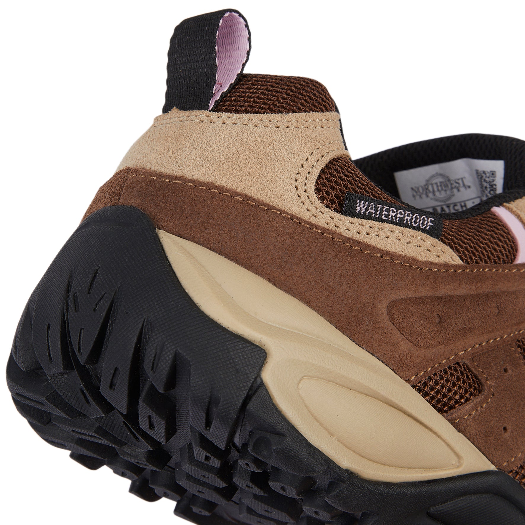 Detail of EDEN Brown women's walking shoes highlighting the waterproof construction and durable suede leather upper.