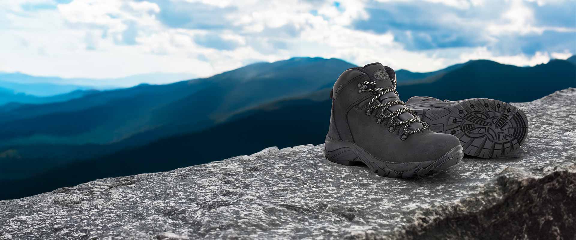 Outdoor footwear banner showcasing a collection of durable boots for hiking and walking.