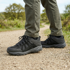 Man wearing Steen men's black suede leather waterproof walking shoes on a hiking trail